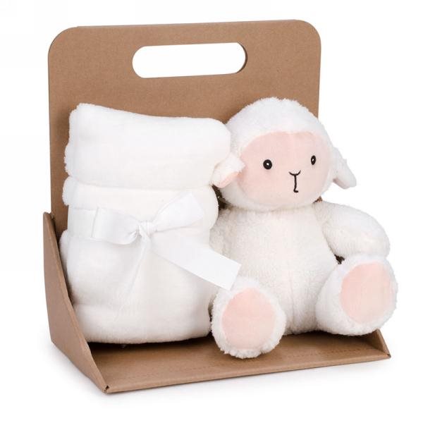 Peluche de mouton blanc et couverture